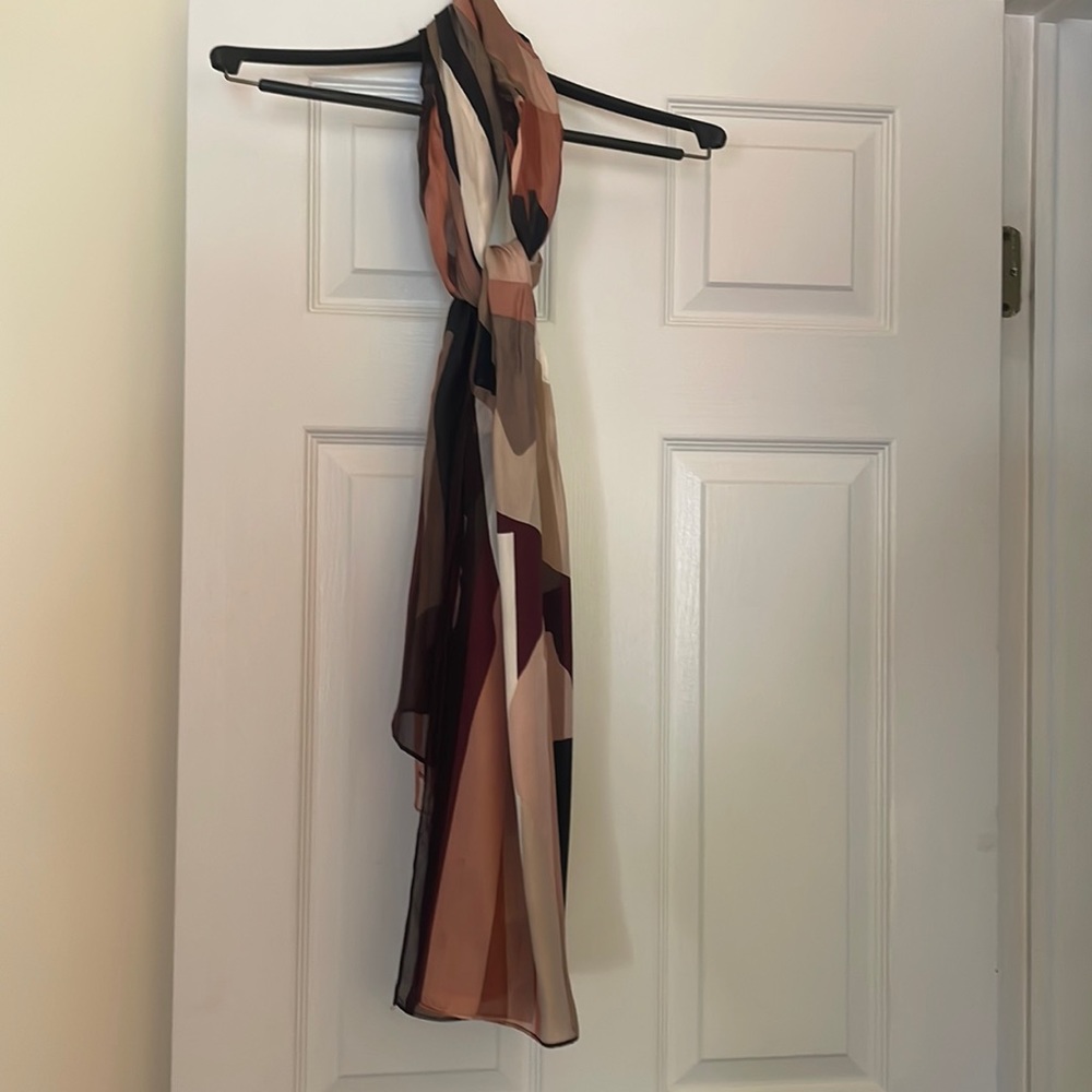 Beautiful multicolored scarf. Colors of cream tan burgundy black tan & rose